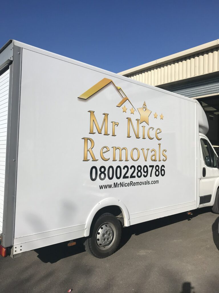 A white van with the words " mr nice removals ".